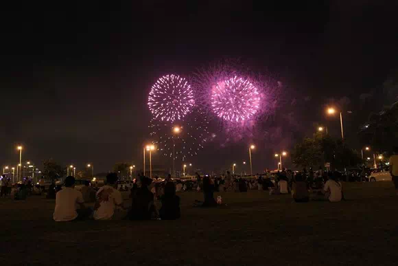 Watching fireworks near Macau Tower