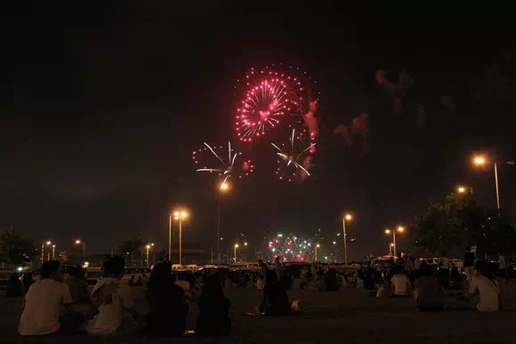 Watching fireworks near Macau Tower